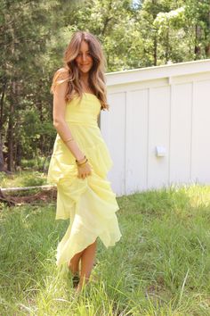 Sunshine Maxi Dress Dresses Ruffled Tiered Maxi Dress For Brunch, Ruffled Tiered Skirt Maxi Dress For Brunch, Garden Party Midi Maxi Dress With Ruffled Skirt, Yellow Strapless Dress For Garden Party, Yellow Dress With Ruffle Hem, Strapless Ruffled Midi Dress For Garden Party, Maxi Dress With Ruffled Skirt And Straps For Brunch, Chic Summer Maxi Dress With Layered Hem, Yellow Dress With Ruffled Straps And Details