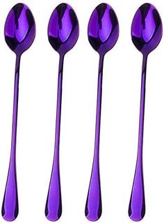 four purple spoons are lined up next to each other