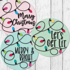 three christmas ornament cutouts with merry lights and bright words on the front