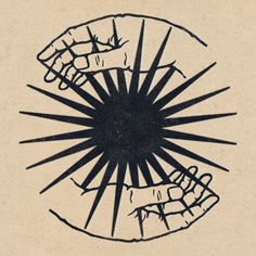 a drawing of two hands holding each other over a sunburst design on a piece of paper