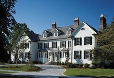 a large white house with lots of windows