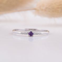 14k solid white gold amethyst promise ring for her,Small & dainty womens promise ring,Womens amethyst gold ring,Unique delicate promise ring WE OFFER UNLIMITED PERIOD INSTALLMENTS PLAN This is a beautiful, stunning, feminine ring that works well for all occasions, styles, and ages. You will love it! Ring information: Main stone: Amethyst Approximate size: 2.5mm Accent stones: Cubic zirconia Approximate size: 1.0mm (6 stones) Metal type: Gold Metal stamp: 14k Gold Installment Payments We offe Amethyst Promise Ring With Diamond Accents In Sterling Silver, Purple Diamond Promise Ring In Fine Jewelry Style, Sterling Silver Amethyst Ring With Diamond Accents For Promise, Dainty White Gold Birthstone Promise Ring, White Gold Dainty Birthstone Ring With Prong Setting, Dainty White Gold Birthstone Ring With Prong Setting, Amethyst Round Cut Ring With Diamond Accents For Promise, Elegant Amethyst Stackable Promise Rings, Dainty Purple Birthstone Ring With Prong Setting