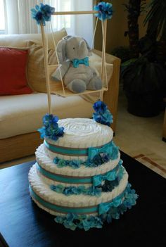 a diaper cake sitting on top of a table