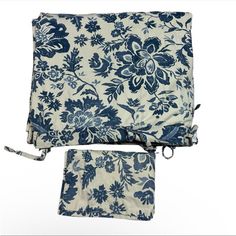 two pieces of blue and white floral fabric