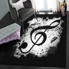 a black and white area rug with musical notes on it