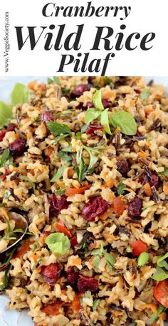 cranberry wild rice salad on a white plate with text overlay that reads, cranberry wild rice platter