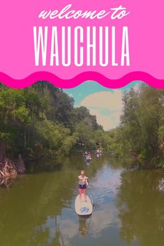 a woman riding on top of a paddle boat in a river with the words welcome to wauchua