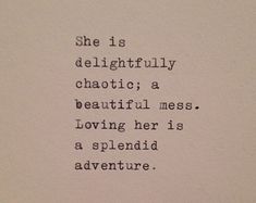 an old typewriter with the words she is delightful chaotic a beautiful mess loving her is a splendid adventure