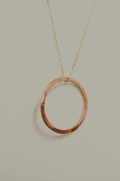 Looking for a highly wearable, minimalist pendant to add to your chain? Try the Small Open Circle Pendant! This style was designed to be an everyday staple. It’s simple, timeless and elegant — adorable with any necklace stack and easy to dress up for going out or wear it with jeans and a tee shirt. THIS LISTING IS FOR A SINGLE PENDANT.Each Small Circle Pendant measures approximately in 1” diameter.Available in 14K GOLD FILL, 14K ROSE GOLD FILL or STERLING SILVER To make this pendant we hand-form Everyday Simple 14k Gold Jewelry, Everyday 14k Gold Oval Pendant Jewelry, Everyday 14k Gold Oval Pendant Necklace, Simple 14k Rose Gold Filled Jewelry, Simple Rose Gold 14k Gold-filled Jewelry, Everyday 14k Gold Hammered Jewelry, Minimalist Hammered 14k Gold Filled Necklaces, Simple Everyday Jewelry With Delicate Chain, Minimalist Everyday Jewelry In Recycled Gold