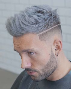 This haircut was included in Faux Hawk Fade Haircuts: 19 Of The Best Fohawk Styles For 2024. See more men's hairstyles at MensFlair.com White Boy Haircuts, Fohawk Haircut, Haircut Ideas Trendy, Braids With Fade, Low Skin Fade, Faux Hawk Hairstyles, Mens Summer Hairstyles, Short Spiked Hair, Grey Hair Dye