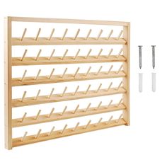 a wooden wine rack with two screws on each side