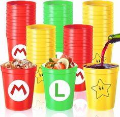 several cups filled with different types of food and drink being poured into each other's buckets