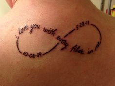 the back of a woman's neck with a tattoo saying i love you with every time