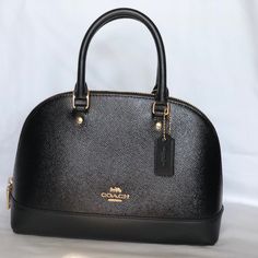 Brand New With Tags Coach Mini Sierra Satchel In Pnt Crossgrain Leather Crossbody Handbag Color:Black / Gold Hardware Handles With 3 1/2” Drop Longer Strap With 21 1/2” For Shoulder Or Crossbody Wear Size: 10 1/4” (L) X 7” (H) X 4” (W) Zip-Top Closure And Fabric Lining No Trades Classic Black Satchel In Textured Leather, Coach Textured Leather Bag For Formal Occasions, Elegant Black Coach Satchel, Classic Black Textured Leather Satchel, Formal Coach Bag With Textured Leather, High-end Black Bags For Work, High-end Black Bags For Workwear, Elegant Black Textured Leather Satchel, Formal Coach Textured Leather Bag