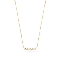 This petite diamond bar necklace is the perfect everyday staple. Simple and classic on its own, it is also a great layering necklace. This dainty 14 karat gold and diamond bar necklace features white round diamonds bezel set in a row. The bezel settings wrap around each diamond providing not only a modern look but also a protective setting. This piece is a contemporary twist on the classic diamond bar necklace. The adjustable chain means this beauty will look perfect with any neckline and makes Bar Necklaces, Dana Rebecca Designs, Diamond Bar Necklace, Diamond Bar, Layering Necklace, Eternity Band Diamond, Diamond Eternity, Bezel Diamond, Diamond Pendant Necklace