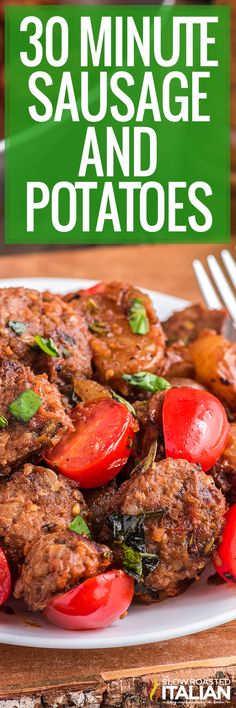 a white plate topped with meat and tomatoes