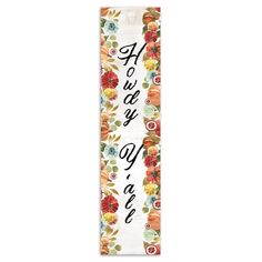 a white bookmark with flowers and words on the front, in black lettering that says happy