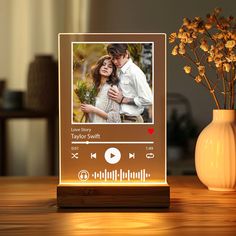 an image of a couple on their wedding day with music player and flowers in the background