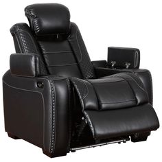 the reclining chair is black leather with stitching