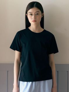 Composition : Cotton 100%Country of Origin : KOREA Black Cotton Minimalist Tops, Black Minimalist Cotton Top, Minimalist Black Cotton Tops, Simple Black Cotton T-shirt, Black Basic Style T-shirt For Everyday, Black Minimalist Cotton T-shirt, Minimalist Black Cotton T-shirt, Black Cotton Minimalist T-shirt, Composition