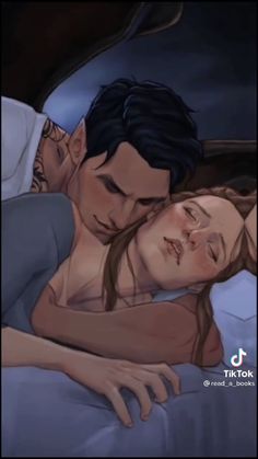 a man and woman laying in bed next to each other with their arms around each other