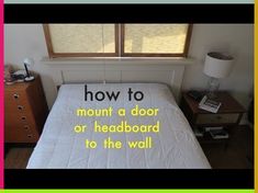 there is a bed with a white sheet on it and the words how to mount a door or headboard to the wall