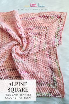 a pink blanket with the words alpine square written on it