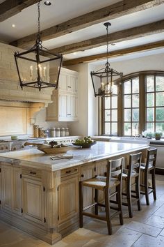 a large kitchen with an island in the middle