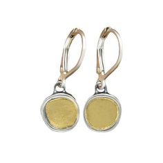 Beautiful 24K gold shines in the center of these modern earrings made using the Korean Keum-boo gilding technique. Small and light enough to be worn every day, they can be dressed up or worn casual. The sterling backing frames the gold circle making it stand out. They have a secure gold-filled leverback ear wire and measure 3/8ths of an inch high without the leverback and 1 inch high with the leverback. To see all my mixed metal jewelry go here:https://www.etsy.com/shop/marmarModern?ref=seller-p Silver Earrings With Recycled Gold As A Gift, Silver Earrings With Recycled Gold For Gift, Gold Hammered Sterling Silver Earrings, Gold Earrings With Ear Wire In Recycled Gold, Gold Earrings Of Recycled Gold For Anniversary, Gold Recycled Gold Earrings With Ear Wire, Gold Recycled Gold Earrings For Anniversary, Gold Small Hoop Hammered Earrings, Gold Sterling Silver Earrings