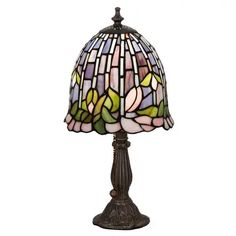 a table lamp with a stained glass shade