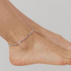 Our Italian-made Specchio Mirror Chain Anklet is a fun, flirty, and fashionable addition to your anklet collection! The Double Strand Specchio Mirror Chain Anklet is sure to be your new "go-to" accessory for fun in the sun or an elegant evening out. Options: Also Available in Gold SEE ALL ANKLETS PRODUCT DETAILS Size: 9"+1" extension, including clasp Closure: Lobster Clasp Metal: .925 Sterling Silver Finish: Rhodium (prevents tarnishing) Silver Party Anklets Ankle Wrap, Silver Ankle Wrap Anklets For Party, Party Silver Ankle Wrap Anklets, Silver Anklets With Adjustable Chain For Parties, Silver Adjustable Chain Anklets For Party, Trendy Silver Adjustable Anklets, Trendy Silver Anklets With Adjustable Chain, Trendy Silver Adjustable Chain Anklets, Trendy Silver Anklets For Party