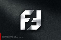 the letter f is made up of metal and has a black background with silver letters