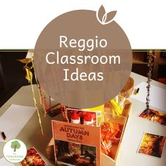 a table topped with books and pictures next to a sign that says regio classroom ideas