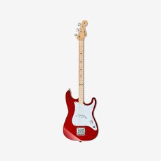 an electric guitar with a red body and white fretset on it's neck