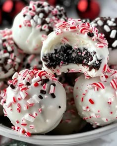 white chocolate covered peppermint balls in a bowl