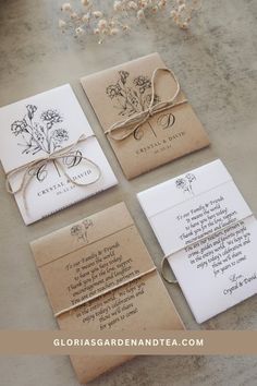 wedding stationery with flowers and ribbon tied around them