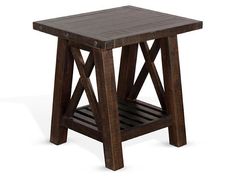 a small wooden table sitting on top of a white floor