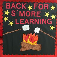 a sign that says back for s'more learning with fire and logs on it