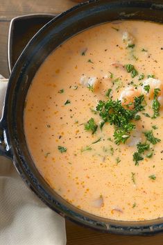 a bowl of soup is sitting on a table