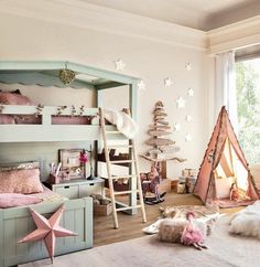 a child's bedroom with bunk beds, toys and other items on the floor