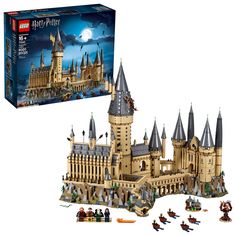 a lego hogwarts castle set is shown in front of the box and it's contents