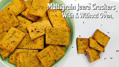 a bowl filled with crackers next to a pile of rice