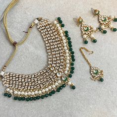 Unique faux Kundan green necklace with green  bead drop   Adjustable string, 2.5 inch  Earring 2.5inch x 1 inch  Tikka 1 inch x 0.5 inch  Perfect for brides Wedding Jewellery Necklace, Jewellery Gift, Bright Gold, Green Necklace, Gold Set, Green Bead, Fashion Jewellery, Pakistani Fashion, Wedding Necklace