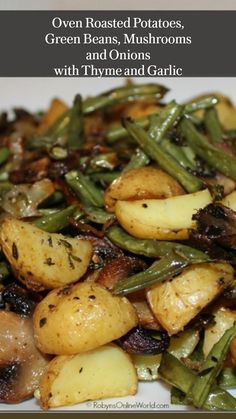 cooked potatoes, green beans, mushrooms and onions with thyme and garlic on a white plate