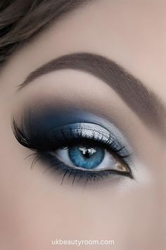 Smokey eye makeup can help to enhances blue eyes by making them stand out, and appear more vibrant. It also adds depth and allure. This post contains a list of smokey eye makeup looks for blue eyes. soft, natural, bridal, light, brown, step by step, dark, tutorial, wedding, navy, ideas for Eye Makeup For Navy Blue Dress Prom, Blue Eyeshadow With Brown Eyes, Navy And Silver Makeup, Prom Makeup For Blue Eyes Brown Hair, Blue Eyes Eyeshadow Looks, Eye Makeup For Navy Blue Dress, Smokey Eye Makeup Blue, Water Makeup Look, Water Makeup Looks