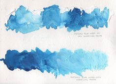 three different shades of blue paint on white paper, one with watercolor and the other without