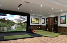 a golf simulator is set up in the middle of a room