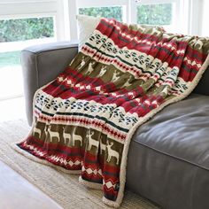 a couch with a blanket on top of it