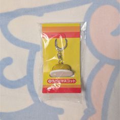 a plastic bag with a keychain attached to it