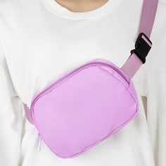 Your browser does not support the video tag. Trendy Nylon Chest Bag For School, Solid Nylon Chest Bag With Pockets, Casual Purple Belt Bag For Travel, Nylon Crossbody Belt Bag For School, Casual Nylon Chest Bag, Casual Solid Nylon Chest Bag, Nylon Belt Bag With Adjustable Strap For School, Barbie Purple, Fanny Pack Style